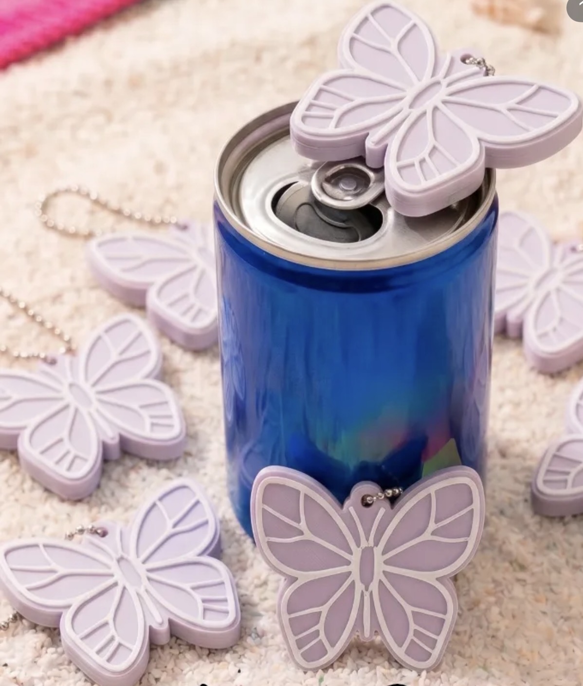 Chaveiros de borboleta em lilás para tampar latas