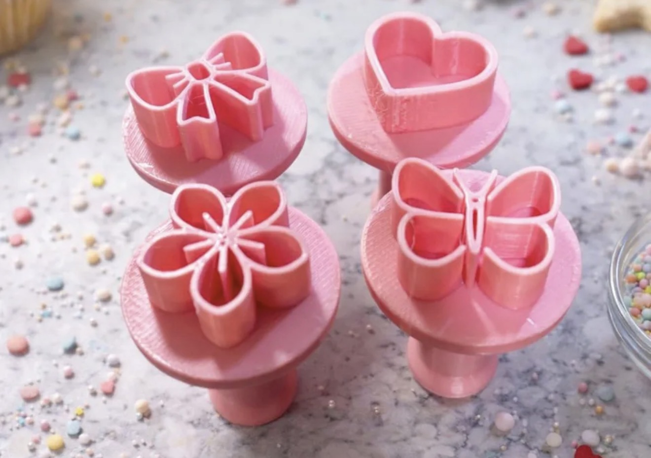 Carimbos de laço, coração, flor e borboleta para brigadeiros